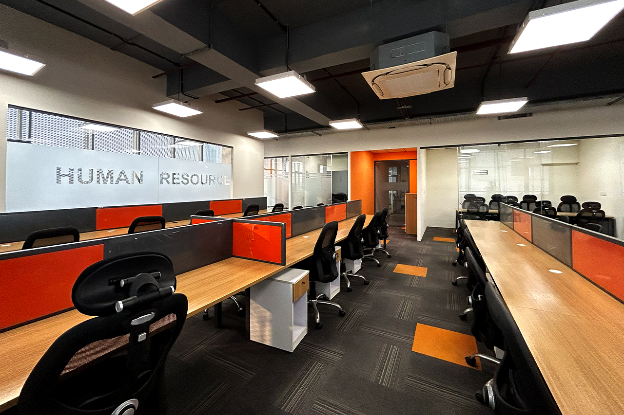 Modern shared office workspace at Worknomic Noida with natural lighting