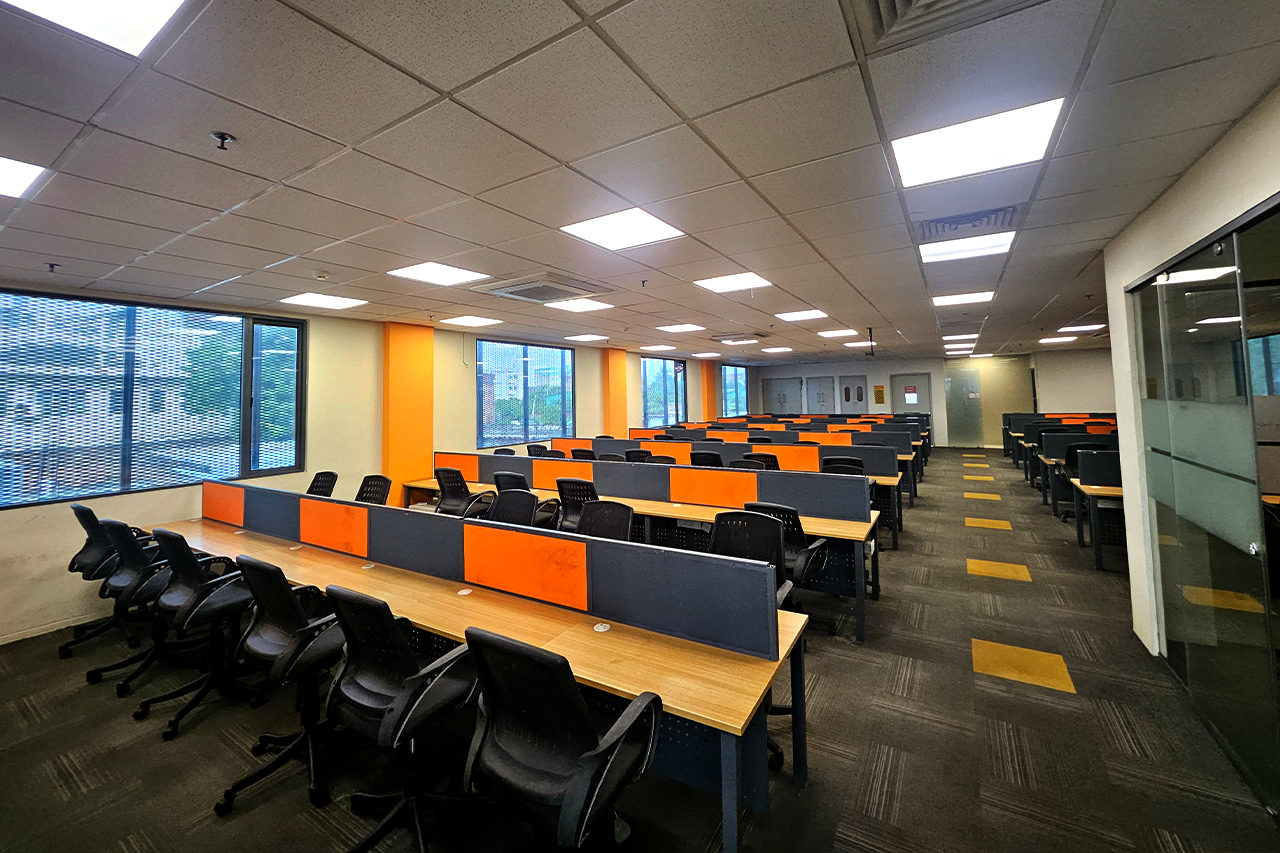 Professionals collaborating in an eco-friendly coworking environment